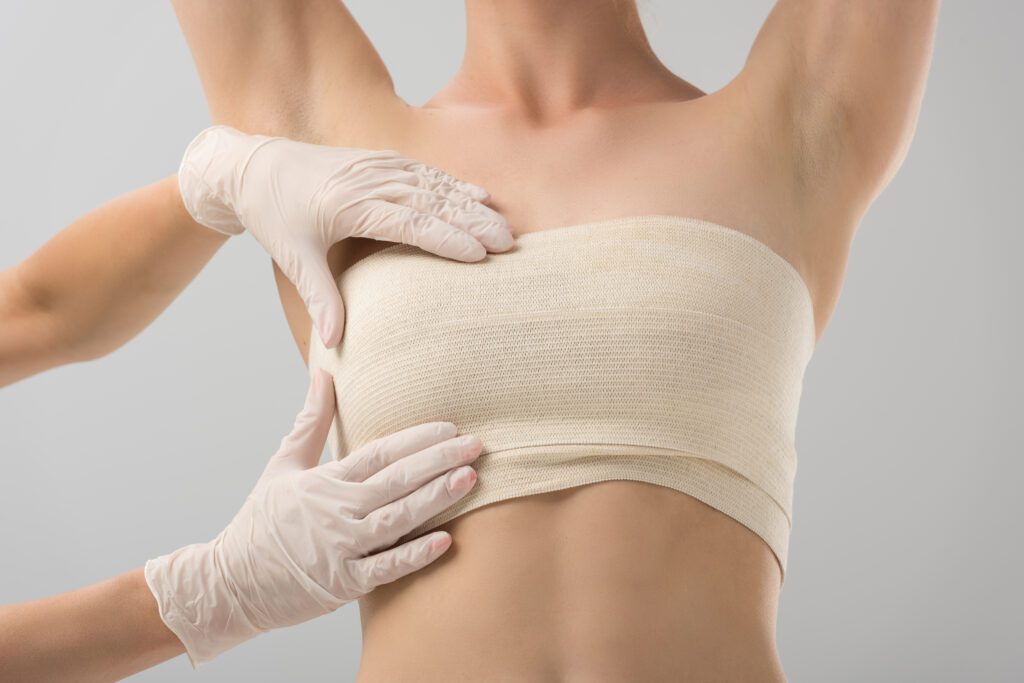 Partial view of plastic surgeon in latex gloves an 2022 12 16 20 57 18 utc