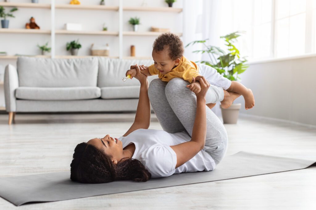 Sport activities with baby black mom exercising w 2022 12 16 08 38 23 utc 1